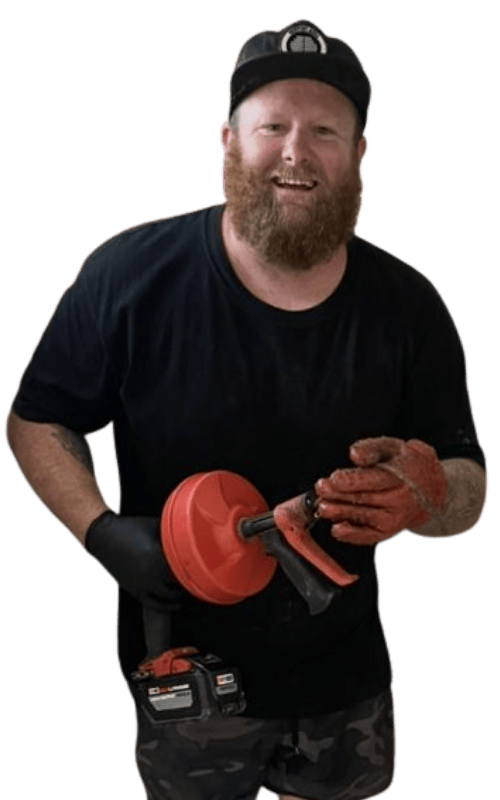 Joseph Russell, owner of Newport-Mesa Drains, holding his drain-cleaning equipment